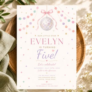 May include: A birthday invitation card featuring a disco ball hanging from a pink ribbon, surrounded by pastel-colored garlands and stars. The text reads: Our Little Star Evelyn is turning Five! Let's celebrate! Saturday, July 12th, 2026, 2:00 PM.