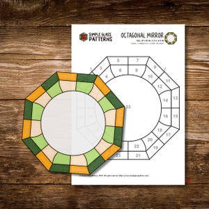 May include: An octagonal mirror pattern design with a colorful stained glass look. The design is 19 x 17.5 inches. The image includes a sample mirror and a numbered diagram for the pattern.