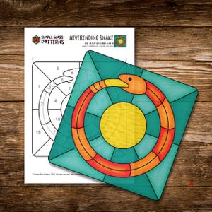 May include: A stained glass pattern titled "Neverending Snake" featuring a teal square with an orange and red snake encircling a yellow sun. The pattern is 7.49 inches square and includes a line drawing for cutting the glass.