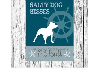 May include: A teal and white print featuring the text "SALTY DOG KISSES" and "Pit Bull". The design includes a white silhouette of a dog, a ship's wheel, and starfish. The text "All you need is love, the beach and a" is also included.