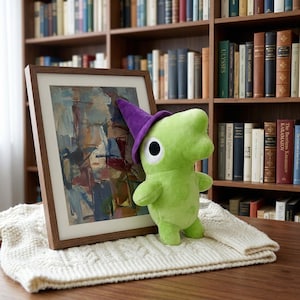 May include: A rustic wooden sign with the text "Welcome to our home" in white lettering. The sign features a distressed finish and a simple, inviting design, perfect for front door decor.