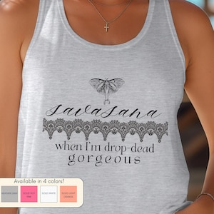 May include: A heather gray tank top featuring a black graphic print of a moth, a lace trim pattern, and the text "SAVASANA when I'm drop-dead gorgeous". A small rectangular label at the bottom displays four color options: heather gray, hot pink, white, and light orange.
