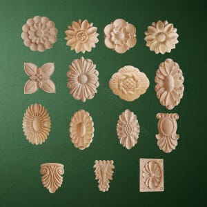 May include: A collection of fifteen light-colored wooden carvings featuring various floral, leaf, and geometric patterns. These decorative wood appliques include circular, oval, and rectangular shapes with intricate relief details and textures.