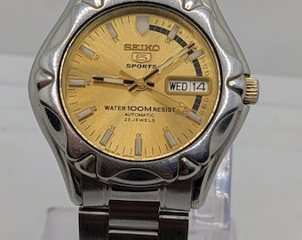 Orologio da uomo vintage Seiko 5 Automatic 7s36-00M0 con indicazione di giorno e data, prodotto in Giappone.