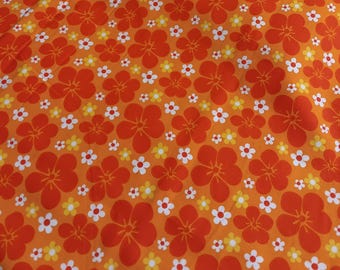 Tela de algodón floral naranja y blanca