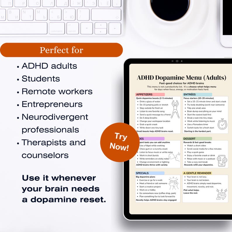 May include: A digital tablet showing an ADHD Dopamine Menu for adults, with sections for appetizers, entrees, and dessert. The tablet is on a white desk with a keyboard and phone. The screen text offers tips for focus and motivation.