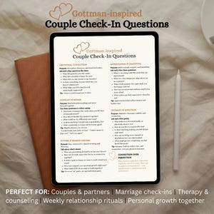 May include: A digital tablet displays "Gottman-inspired Couple Check-In Questions" with sections on emotional connection, appreciation, conflict, and intimacy. A stylus rests beside the tablet, and a brown leather notebook is partially visible.