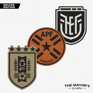 May include: Three soccer-themed patches with team logos. The top left patch reads "SOCCER EDITION". The bottom left patch is tan with a soccer ball and the letters "AFC". The center patch is orange with "APF PARAGUAY". The top right patch is black and white.