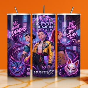 May include: A cylindrical tumbler with a straw featuring a vibrant graphic print of anime-style characters in a neon city setting. The text reads WE HUNT DEMONS, K-POP DEMON HUNTERS, WE SING WE SLAY, and HUNTRX, accompanied by a demon mask and a fox mask.