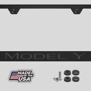 May include: A white ceramic mug with a black handle and the text "But First, Coffee" in a bold, black font. The mug is set against a blurred background, suggesting a cozy setting. The mug appears to be approximately 4 inches tall.