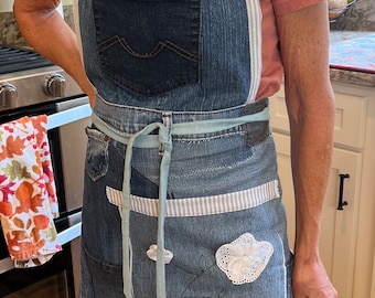 Upcycled denim apron with embroidered flower pocket