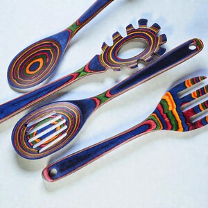 Premium wooden kitchen utensils set designed for nonstick cookware, showcasing smooth Pakkawood finish and ergonomic shapes, perfect for cozy kitchen decor, boho home styling, and everyday cooking in modern USA homes with natural materials.