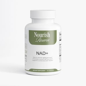 May include: A white supplement bottle with a white cap and a green label. The label reads "Nourish Reserve" and "NAD+". The bottle is a dietary supplement and contains 60 capsules. The label also states that it aids in normal aging, promotes cell function, and supports cardiovascular health.