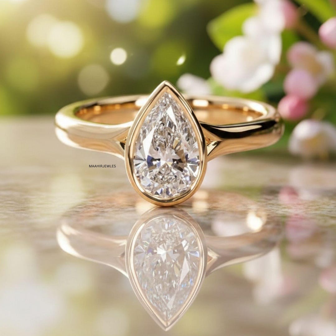 Modern Bezel Set Pear Cut Engagement Ring Nature Inspired Yellow Gold ...