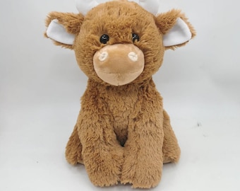 Vaca de peluche: una compañera suave, esponjosa y adorable