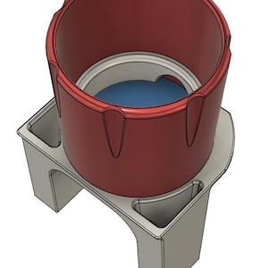 Könnte beinhalten: Ein rotes zylindrisches Objekt mit geriffeltem Oberteil steht auf einer hellgrauen Basis mit zwei Seitenfächern. Das Innere des Zylinders ist weiß und blau. Das Design scheint ein 3D-Rendering eines Produkts zu sein.