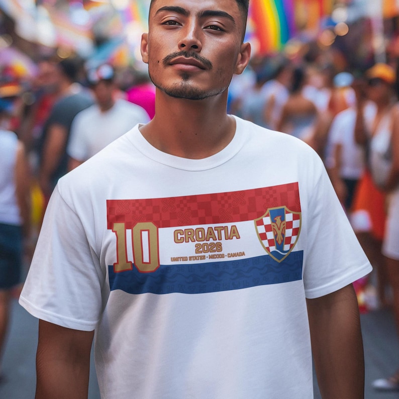May include: White t-shirt featuring the text "CROATIA 2026" with a red, white, and blue design. The number "10" is printed in gold on the left side. The shirt also includes the text "UNITED STATES - MEXICO - CANADA".