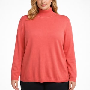 May include: A coral-colored turtleneck sweater with long sleeves. The sweater has a ribbed turtleneck collar and a smooth, knit texture. The garment is shown on a person against a white background. The sweater is a solid color and appears to be made of a soft material.