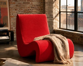 Fauteuil lounge design bas en tissu – Fauteuil moderne arrondi pour salon, chambre ou coin lecture – Chaise d’appoint intérieure