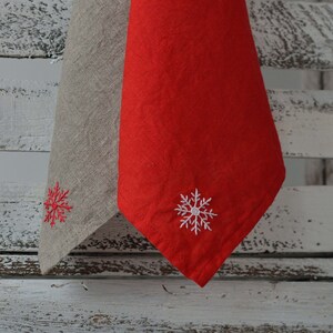 Linen sustainable linen towels in natural and red colors with snowflake design embroidery