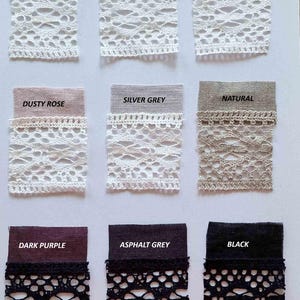 May include: A swatch card showing 10 different fabric colors with a lace trim. The colors are: Milky White, Vanilla Cream, Pale Rose, Dusty Rose, Silver Grey, Natural, Dark Purple, Asphalt Grey, and Black.