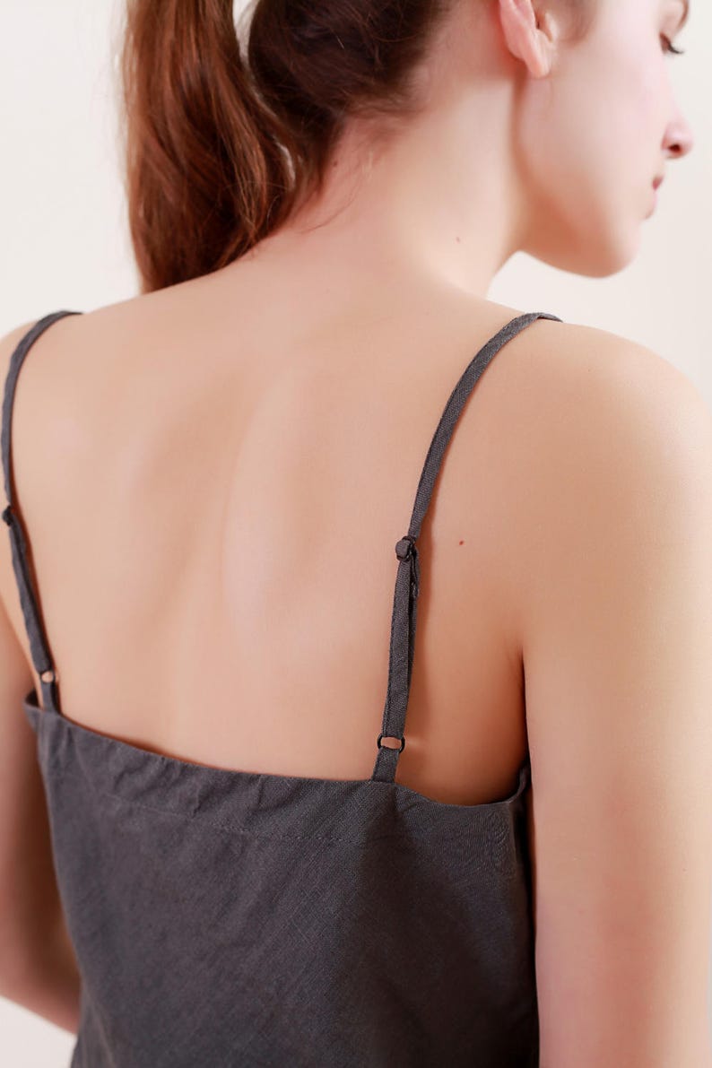 Cami Constance has tiny and adjustable straps in asphalt grey
