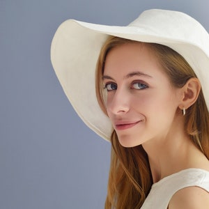 Linen white wedding hat for her with wide brims