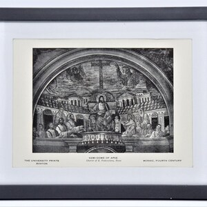 May include: A framed black and white print of a religious mosaic. The artwork shows a central figure with a cross, surrounded by other figures and architectural details. The text at the bottom reads "THE UNIVERSITY PRINTS BOSTON" and "SEMI-DOME OF APSE Church of S. Pudentiana, Rome MOSAIC, FOURTH CENTURY."
