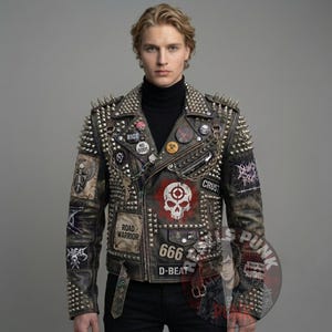 May include: A distressed leather jacket with silver spikes on the shoulders and collar. The jacket features patches with skull and crossbones, the number 666, and the words "Road Warrior" and "Crust".