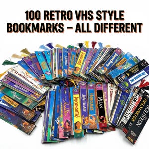 May include: A pile of 100 retro VHS-style bookmarks, each with a unique design. The bookmarks showcase film titles such as "Pocahontas," "Hercules," and "Aladdin." Each bookmark is adorned with a tassel. The text "100 RETRO VHS STYLE BOOKMARKS - ALL DIFFERENT" is at the top.