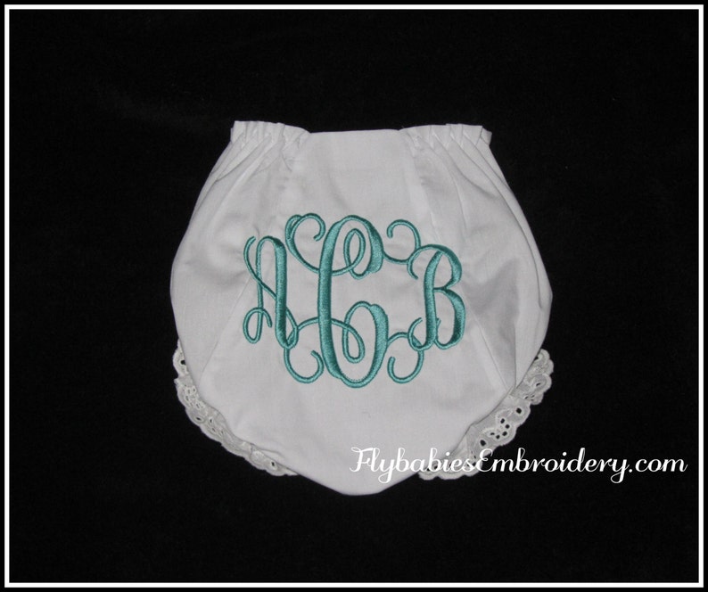 May include: White baby bloomers with a teal blue embroidered monogram "CGB" and a lace trim. Flybabiesembroidery.com
