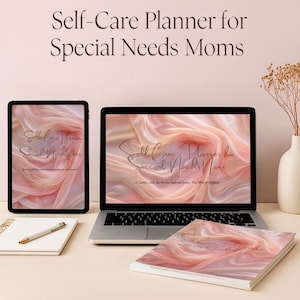 May include: A laptop, tablet, and notebook with the text "Self-Care Planner for Special Needs Moms." The screens and cover display a soft pink and white design. A pen rests on the notebook, and a vase with dried flowers is in the background.