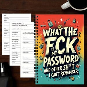 Pode incluir: Um caderno espiralado com o texto "WHAT THE FCK IS MY PASSWORD AND OTHER SH*T I CAN'T REMEMBER." A capa é colorida com ilustrações de chaves e fechaduras. Inclui páginas para informações de internet e computador.
