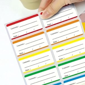 May include: A sheet of multi-coloured labels, each with the words "Contents:" and "Date:" printed on them. The labels are rectangular with a white background and borders in red, orange, yellow, green, and blue.