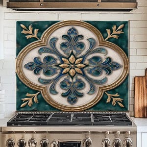 May include: Decorative kitchen backsplash with a floral design. The backsplash features a teal background with a gold and white floral pattern. The design is framed with a gold border. The backsplash is installed above a stainless steel gas range.