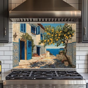 May include: A kitchen backsplash featuring a vibrant painting of a Mediterranean scene. The artwork depicts a sunlit street with a building, blue shutters, and a lemon tree. The ocean is visible in the background, adding depth and color.