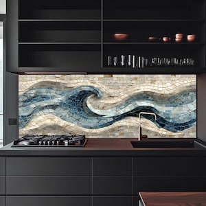 May include: A kitchen backsplash featuring a mosaic tile design of a stylized ocean wave in shades of deep blue, light blue, and cream. The wave pattern flows horizontally across the wall behind a black stovetop and a modern metal faucet.
