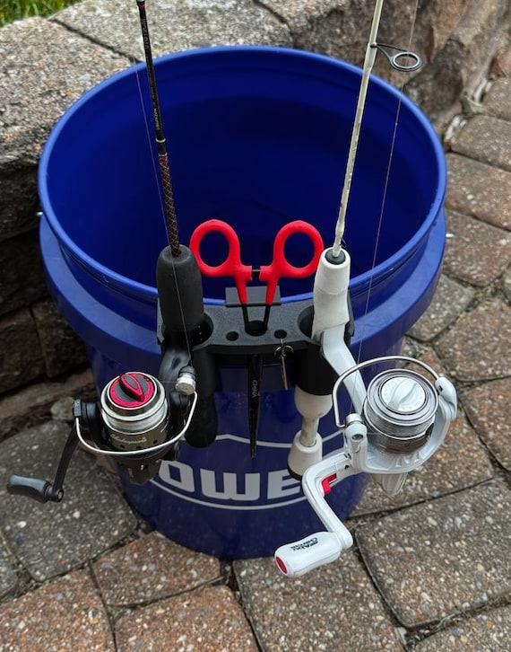 fishing bucket with rod holder HT Master The HT Enterprises Bucket Rocker Rod Holder easily clips onto your bucket to hold your rod combo securely so you can enjoy a hands free ice fishing experience Fishing Rod Holder Fits YETI