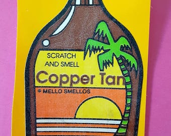 vintage 80's Mello Smello copper tan lotion matte scratch 'n sniff sticker *used*