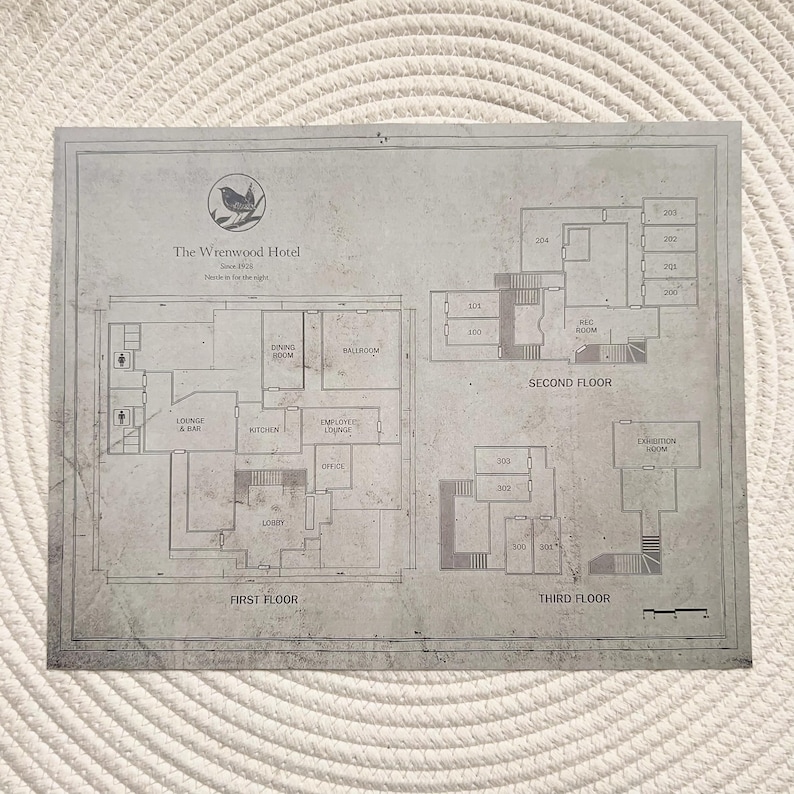 May include: A detailed architectural floor plan of The Wrenwood Hotel, showing three floors with labeled rooms including the dining room, ballroom, and exhibition room. The plan is in shades of grey and includes a bird logo.