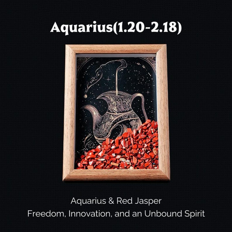 May include: A framed artwork featuring an Aquarius design with a teapot illustration, red jasper stones, and the text "Aquarius & Red Jasper". The artwork is set against a black background with a wooden frame.