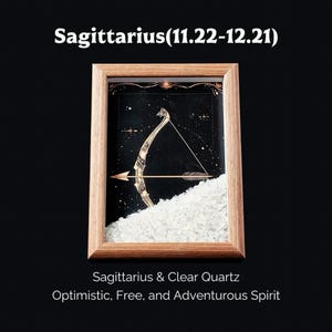 May include: A framed artwork featuring the Sagittarius zodiac symbol, a golden bow and arrow, set against a starry black background. The frame is made of light-colored wood. The text "Sagittarius (11.22-12.21)" is at the top.