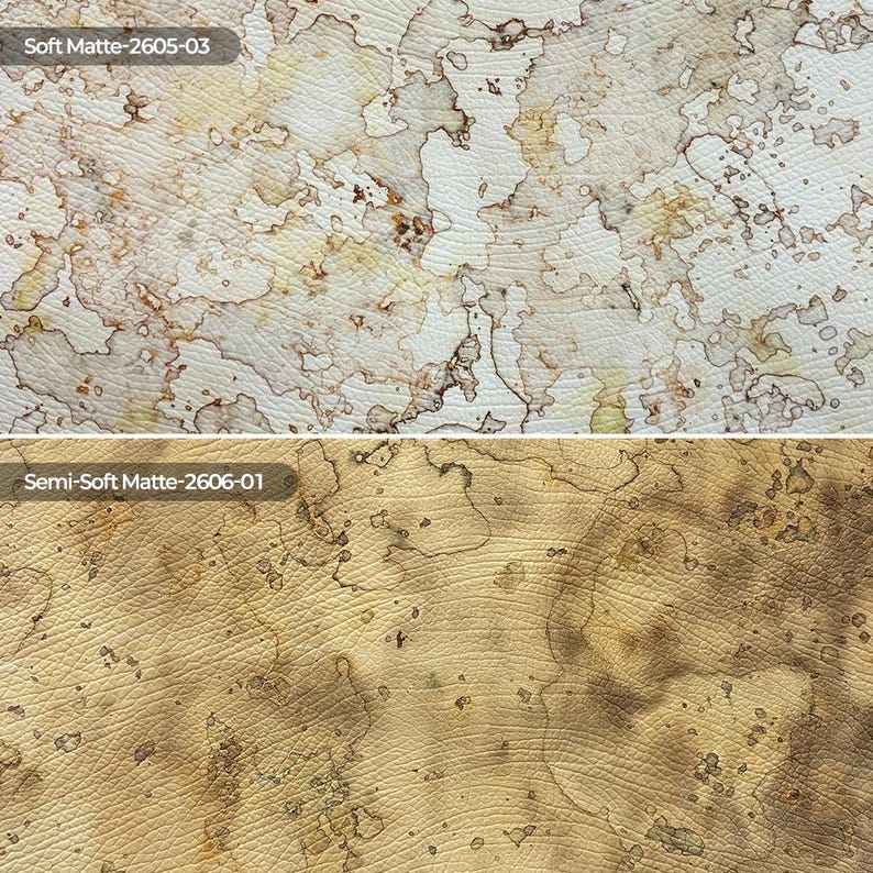 May include: Two textured material samples. The top sample, labeled Soft Matte-2605-03, is white with irregular brown and tan watercolor-like stains. The bottom sample, labeled Semi-Soft Matte-2606-01, is tan with darker brown mottled patterns.