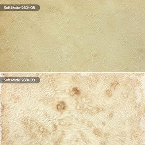 May include: Two swatches of textured material. The top swatch is a solid light beige with the text Soft Matte-2604-08. The bottom swatch is a light beige with irregular brown mottled spots and the text Soft Matte-2604-09. Both have a grain.