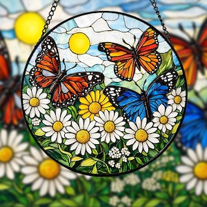 May include: Round stained glass panel featuring butterflies and daisies. The butterflies are orange, red, and blue with black details. White daisies with yellow centers and green leaves are in the foreground. A yellow sun and blue sky background complete the scene.