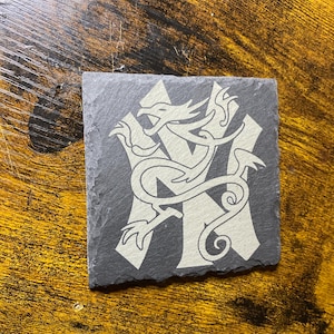 SOIA benefit for Lou’s family engraved slate coaster. Sick of it all.