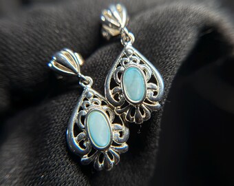 Boucles d'oreilles en argent sterling avec coquillages bleus en filigrane