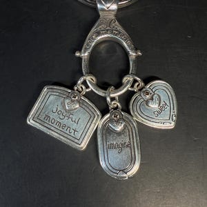 May include: A white ceramic mug with a black handle and the text "But First, Coffee" in a black, bold font. The mug is likely 11-15 ounces in size, perfect for a morning beverage.