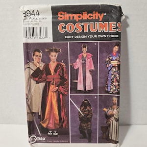 May include: Simplicity Costumes pattern featuring various robe designs. The package includes images of costumes, including a kimono, a hooded robe, and a ninja outfit. The pattern is for all sizes and includes the text "Easy Design Your Own Robe."