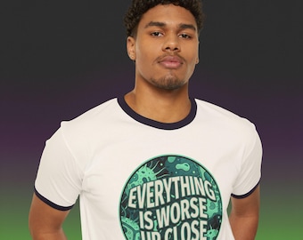 May include: White ringer t-shirt with navy blue trim. The shirt has a circular graphic with the text "EVERYTHING IS WORSE UP CLOSE" in white and green, surrounded by a green design.